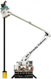 Security Camera Installer On Man Lift